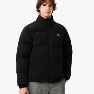 LACOSTE

Piumino con cappuccio impermeabile nero
REF: BH5154-00