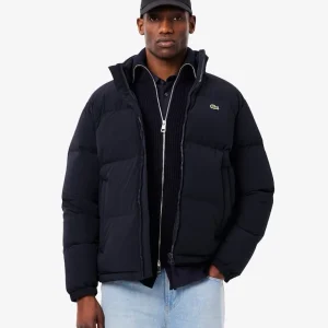 LACOSTE

Piumino con cappuccio impermeabile blu navy
REF: BH5154-00